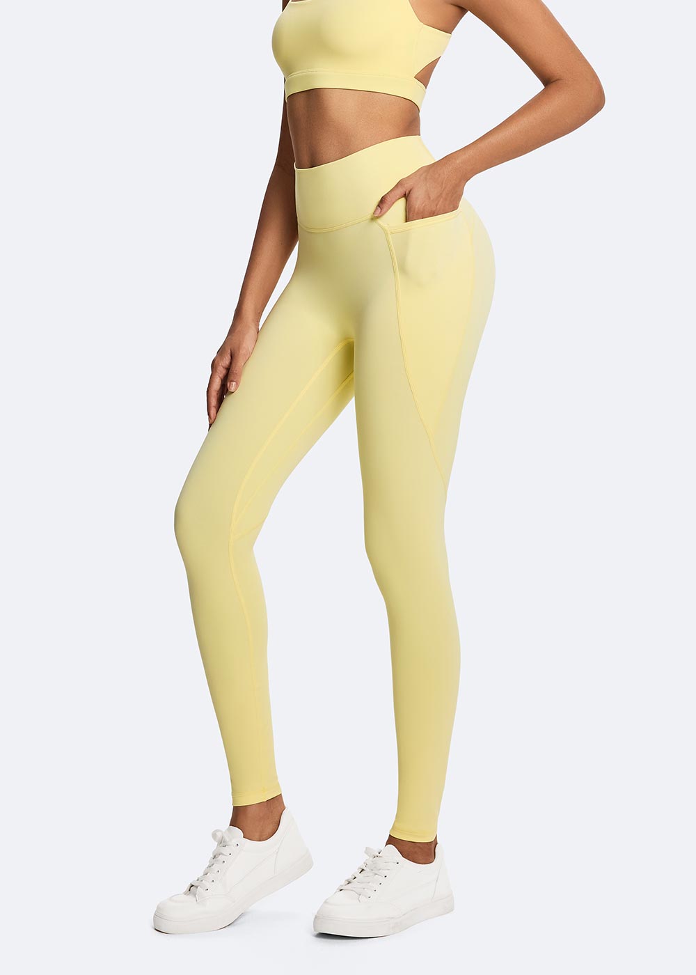 Women's Yellow Cloud-sensing Sports Legging with Pockets Close up on the left side