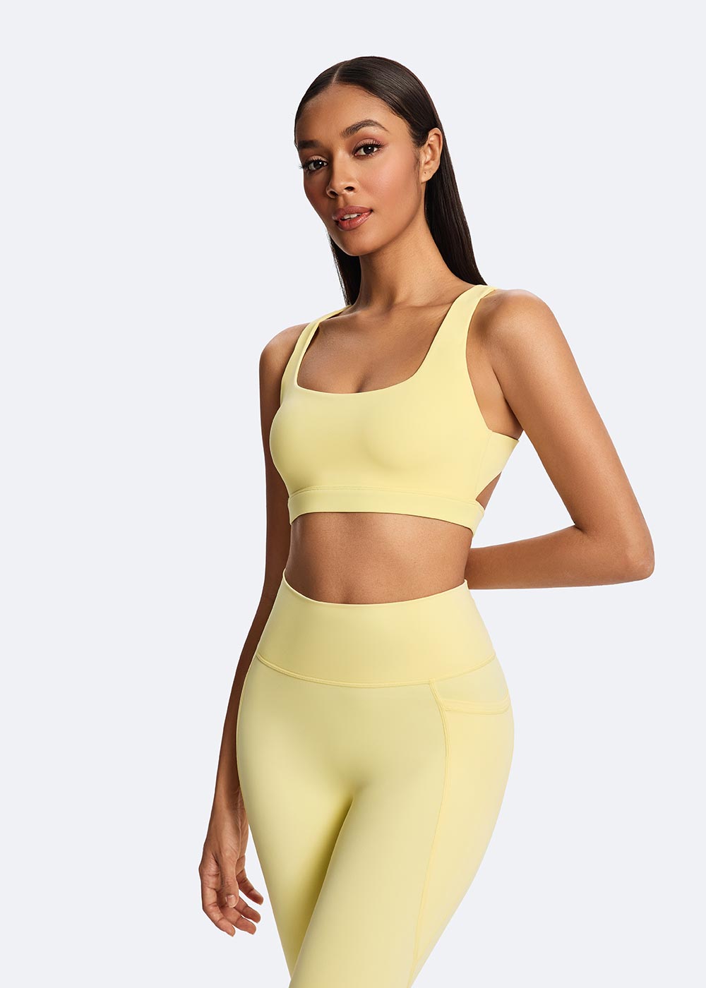 Women's Yellow Elastic Stitched Hem Sports Bra Close up of the left front side