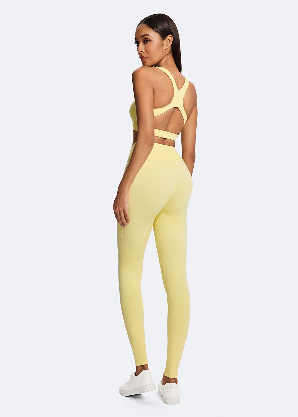 Women's Yellow Elastic Stitched Hem Sports Bra Close up of the left back